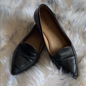 Everlane black pointed toe flats.
